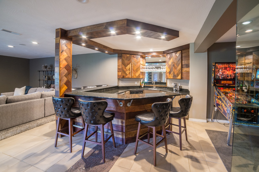 Design ideas for a large midcentury single-wall seated home bar in Other with an undermount sink, flat-panel cabinets, distressed cabinets, granite benchtops and ceramic floors.