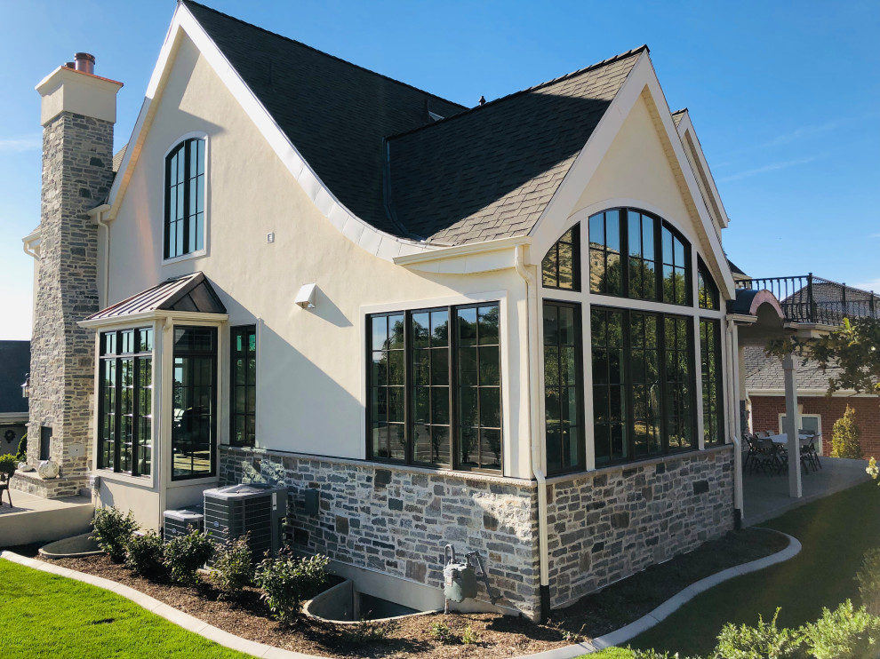 Photo of a medium sized and white classic two floor render detached house in Salt Lake City with a pitched roof, a shingle roof and a grey roof.
