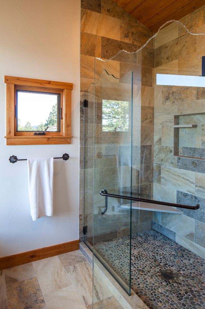 Inspiration for a country bathroom in Denver with a double shower.