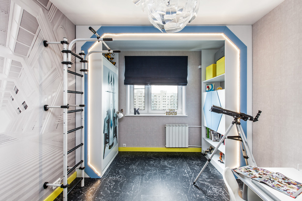Mid-sized contemporary kids' playroom in Moscow with grey walls for kids 4-10 years old and boys.