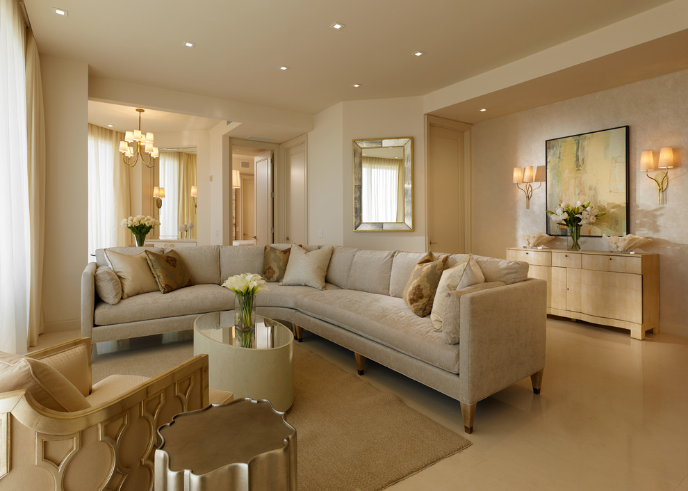 Mid-sized transitional open concept living room in Miami with beige walls and marble floors.