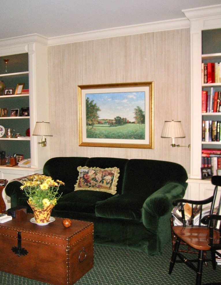 Photo of a mid-sized traditional enclosed living room in New York with beige walls, carpet and green floor.
