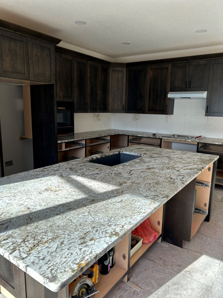 Kitchen - rustic kitchen idea in Denver