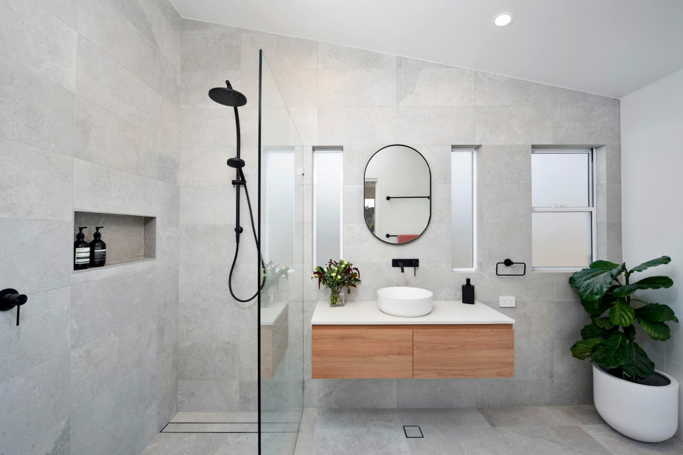 This is an example of a contemporary bathroom in Sydney with a floating vanity.