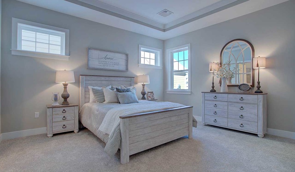 Inspiration for a large arts and crafts master bedroom in Other with grey walls, carpet and beige floor.