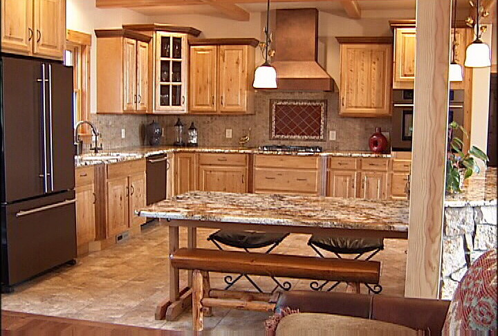 Inspiration for a rustic kitchen remodel with limestone countertops