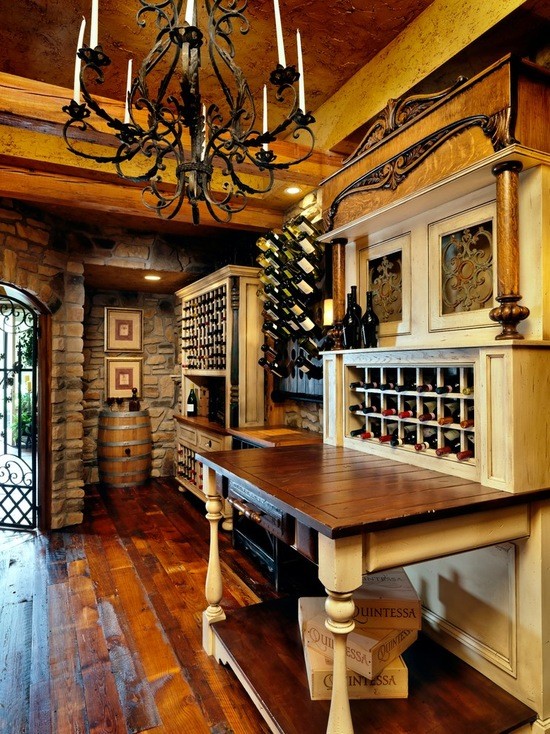 Inspiration for a large country wine cellar in Cincinnati with dark hardwood floors and storage racks.
