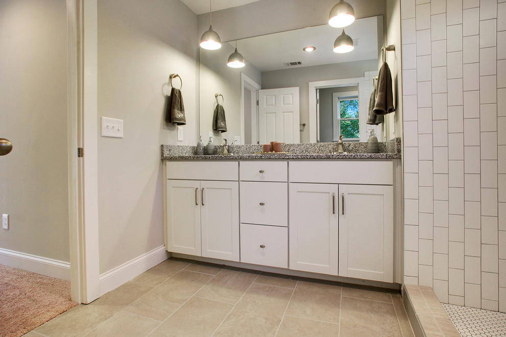 Design ideas for a small transitional master bathroom in Atlanta with shaker cabinets, white cabinets, granite benchtops, an open shower, white tile, glass tile, grey walls and porcelain floors.