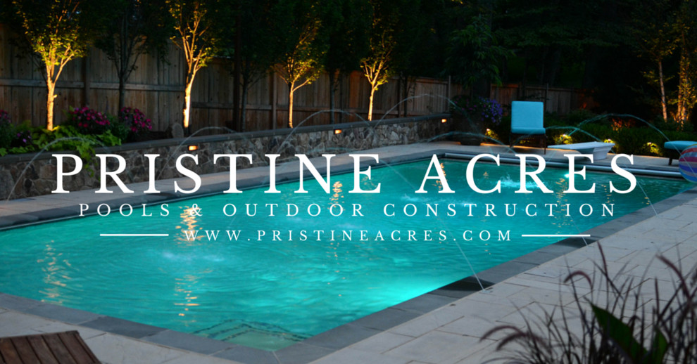Example of a huge transitional backyard concrete paver and rectangular pool design in DC Metro