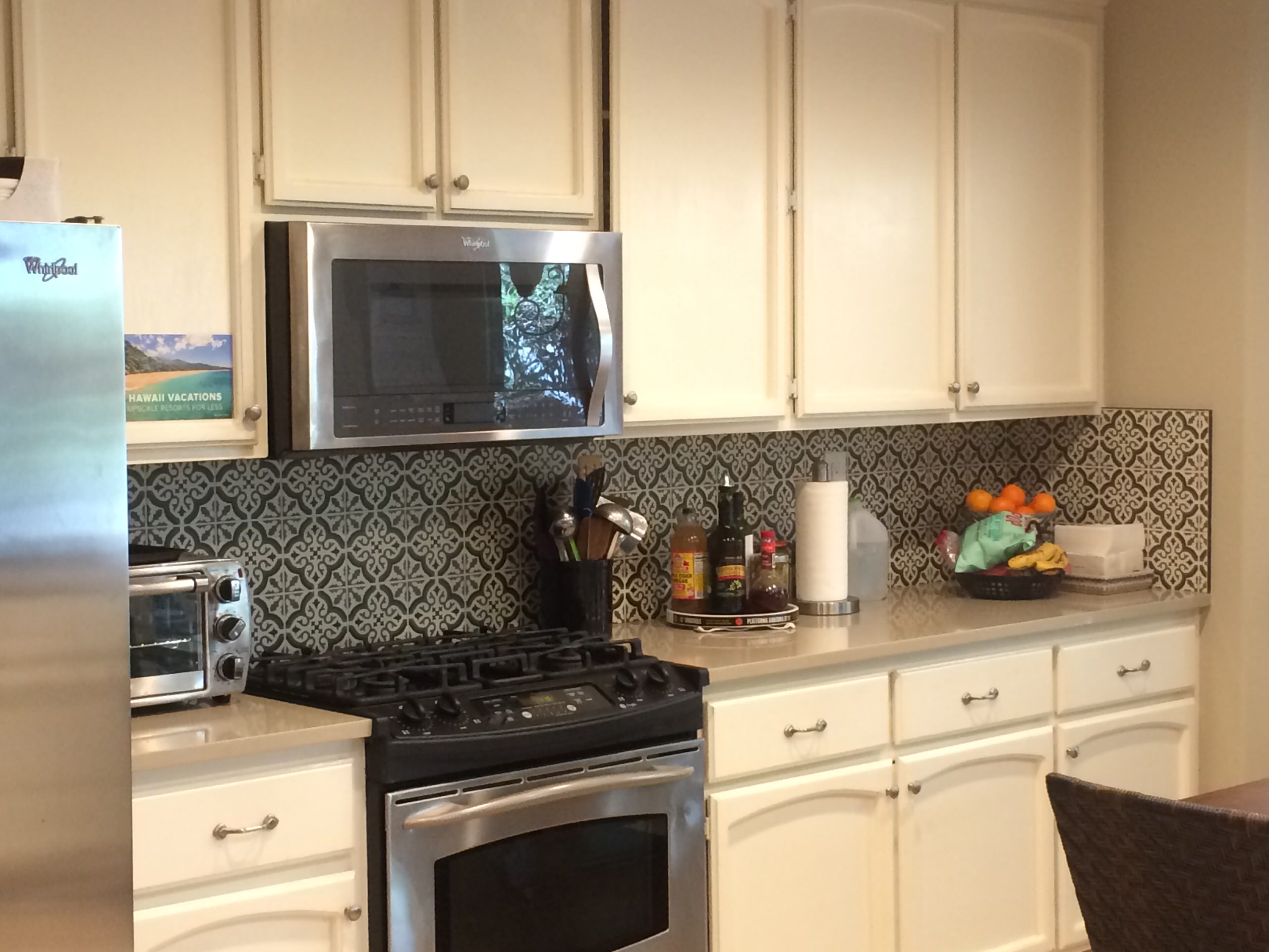 Same Cabinets, New Counter and Back Splash Transform the Kitchen!