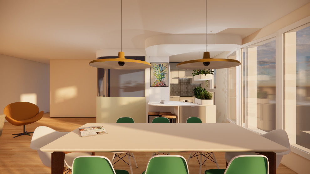 La salle à manger est séparée de la cuisine par un bar muni de rangements