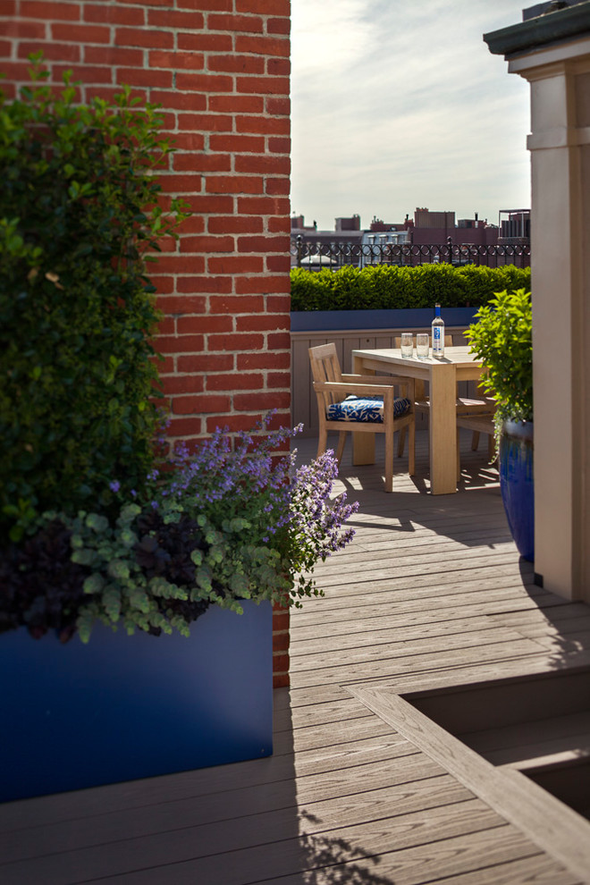 This is an example of a large contemporary rooftop deck in Boston with no cover.