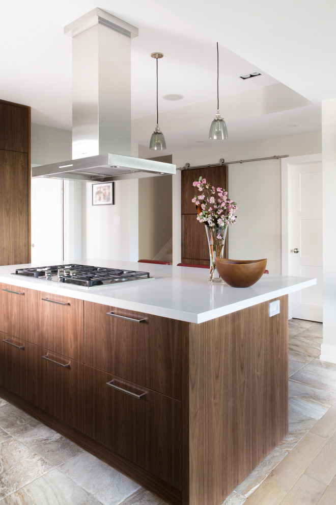 Inspiration for a contemporary kitchen in Toronto with flat-panel cabinets, medium wood cabinets and quartz benchtops.