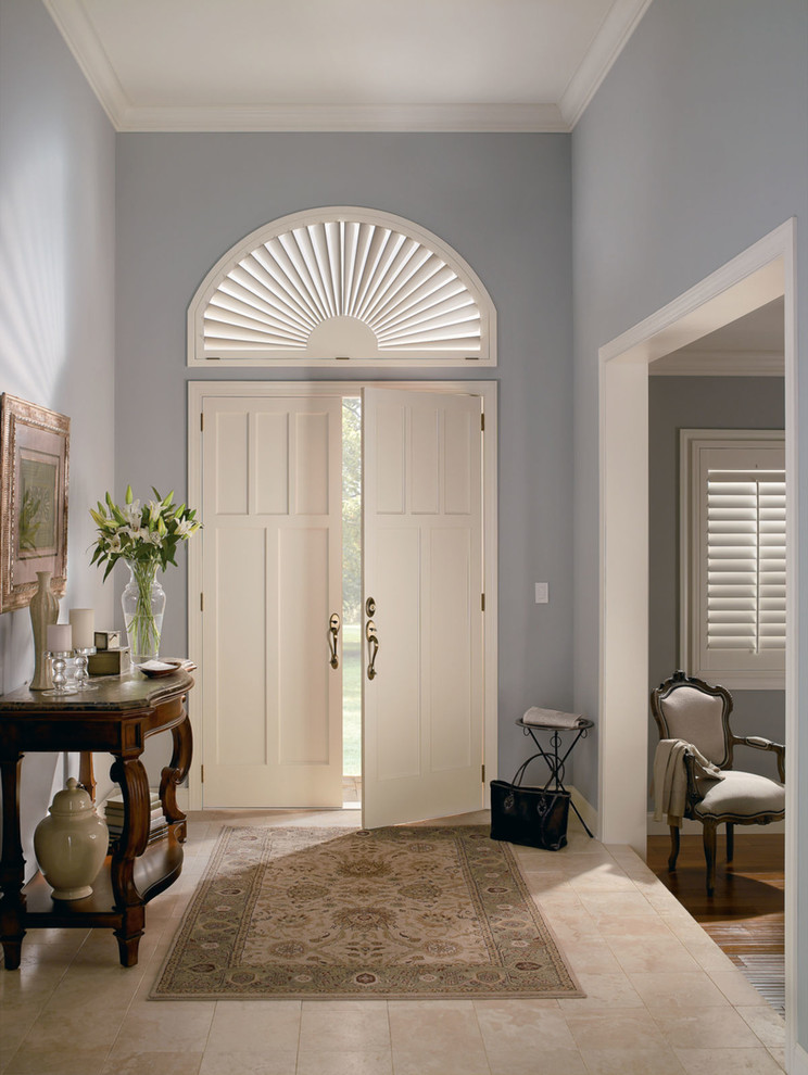 Design ideas for a mid-sized beach style front door in New York with grey walls, ceramic floors, a double front door, a white front door and beige floor.