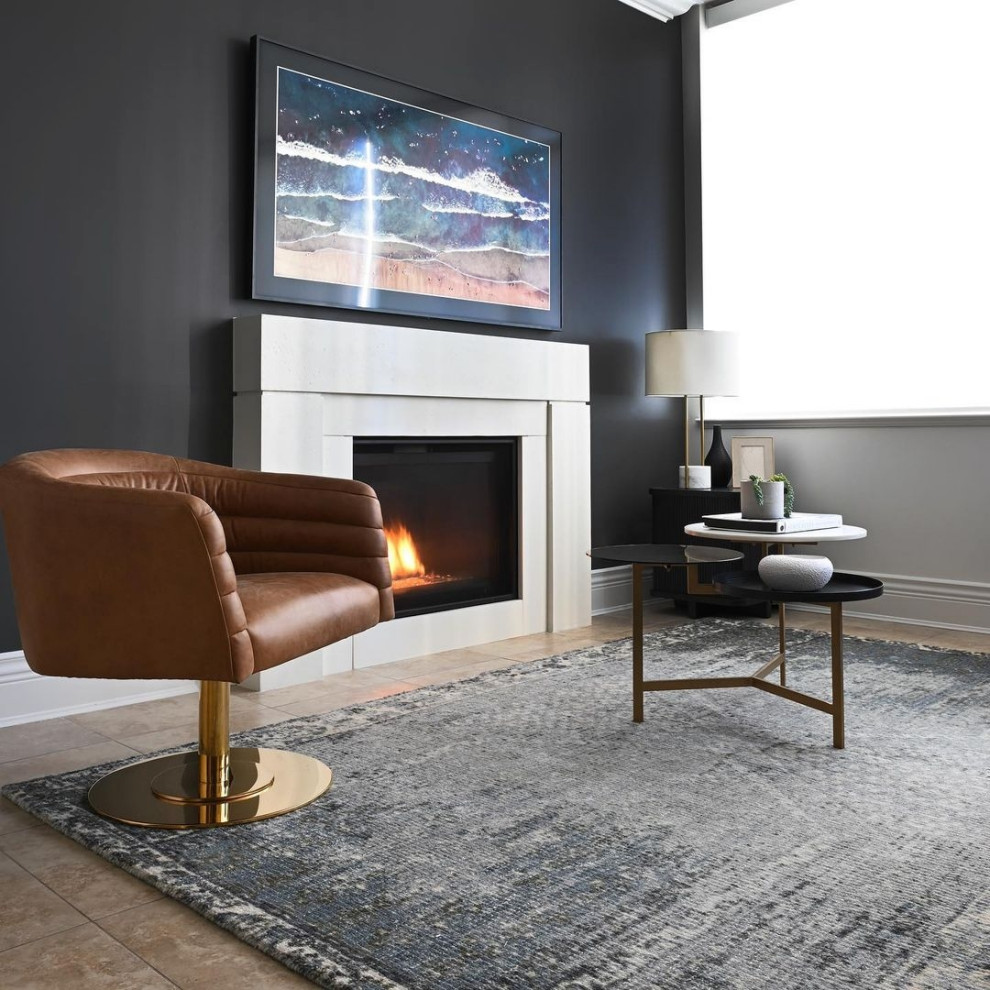This is an example of a modern living room in Vancouver with a ribbon fireplace and a concrete fireplace surround.