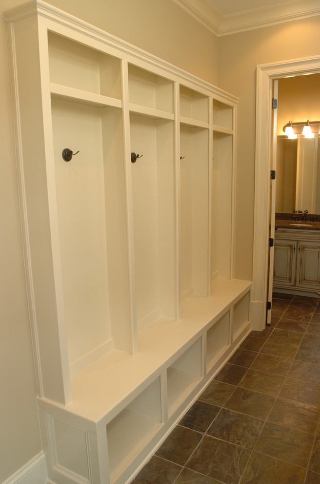 Design ideas for a small traditional mudroom in Atlanta with beige walls.