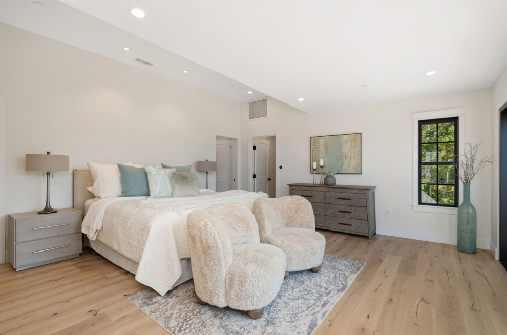Design ideas for a transitional bedroom in San Diego.