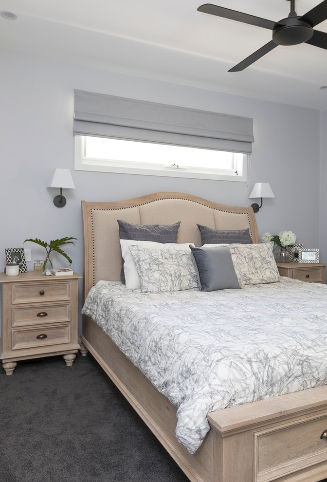 Mid-sized traditional master bedroom in Gold Coast - Tweed with grey walls, carpet and grey floor.