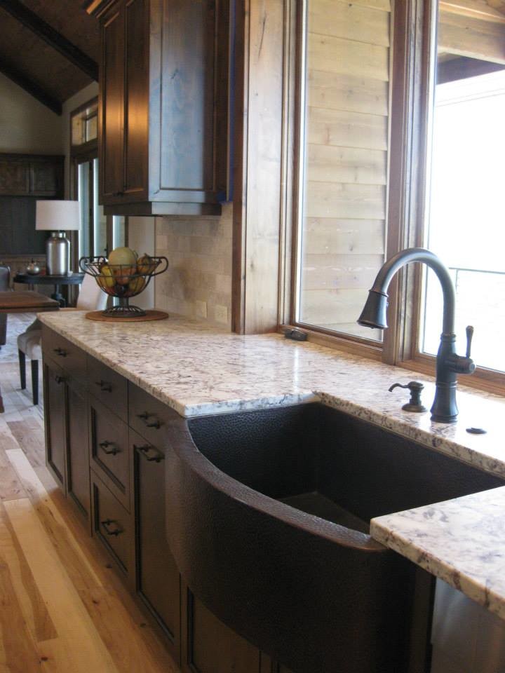 Mid-sized mountain style u-shaped open concept kitchen photo with shaker cabinets