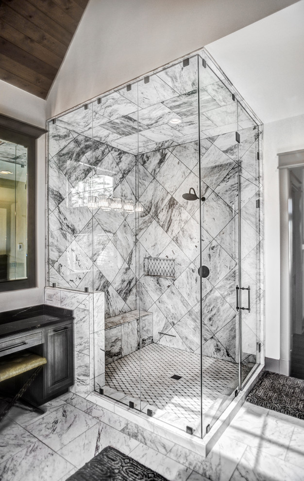 Photo of a large transitional master bathroom in Other with recessed-panel cabinets, dark wood cabinets, a corner shower, black and white tile, marble, white walls, marble floors, granite benchtops, multi-coloured floor, a hinged shower door, black benchtops, a shower seat, a double vanity, a built-in vanity and wood.