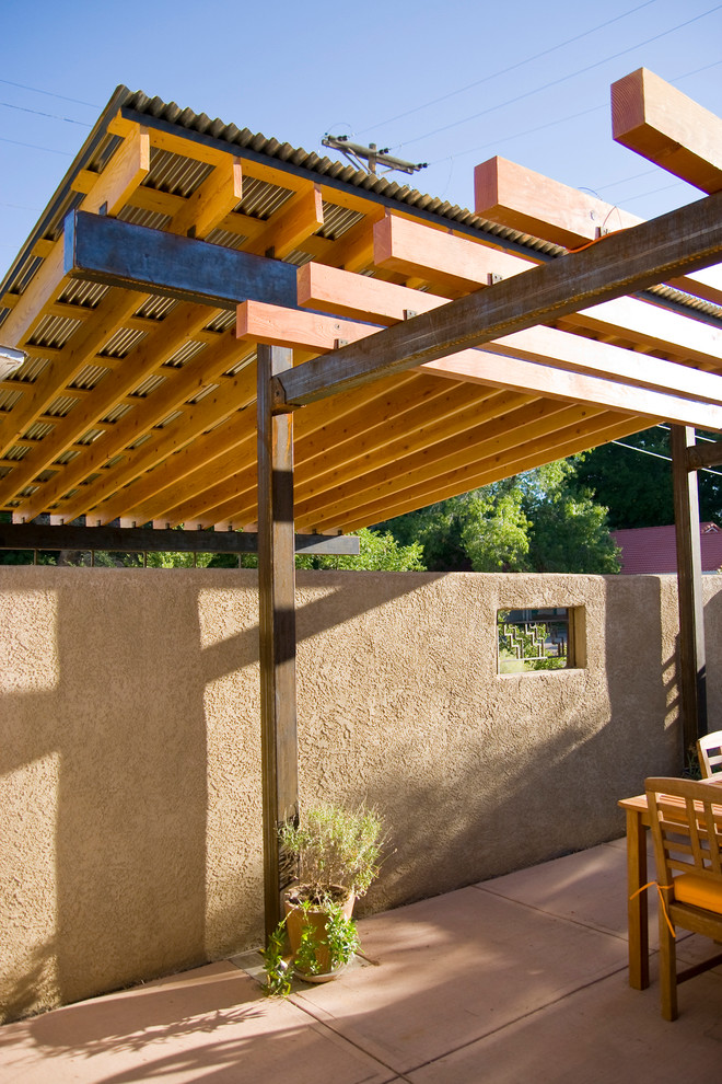Inspiration for a small transitional detached two-car carport in Albuquerque.
