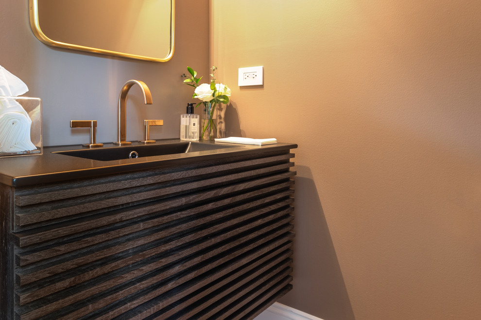 Modern Bathroom Sink with Gold Faucet and Wooden Cabinet