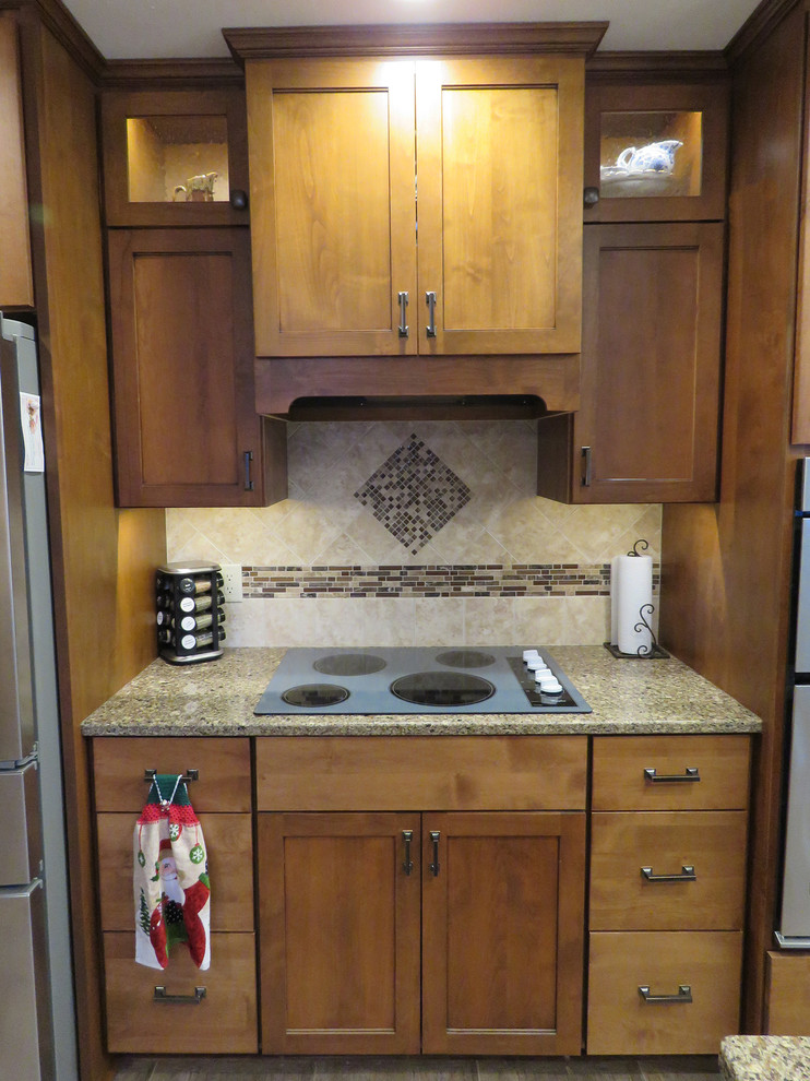 Inspiration for a mid-sized transitional u-shaped vinyl floor open concept kitchen remodel with a double-bowl sink, shaker cabinets, dark wood cabinets, quartz countertops, beige backsplash, cement tile backsplash, stainless steel appliances and a peninsula
