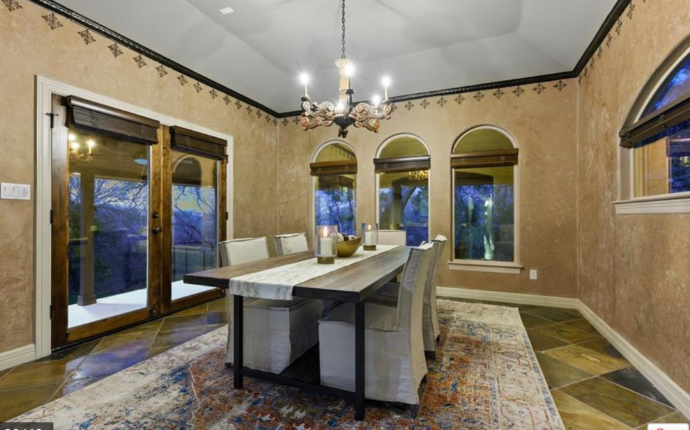 Transitional dining room photo in Austin