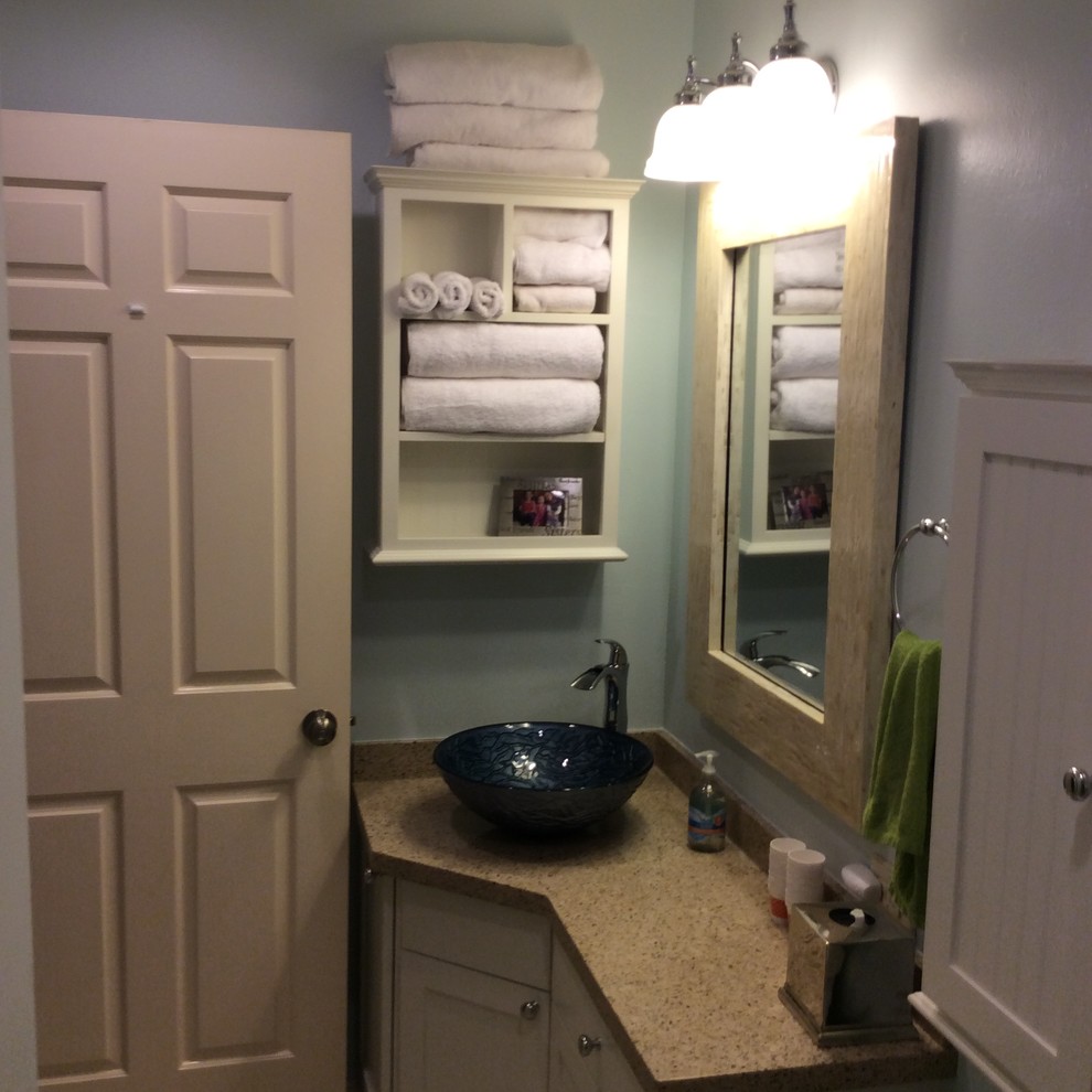 Example of a small transitional bathroom design in Houston with shaker cabinets, white cabinets, a vessel sink and granite countertops