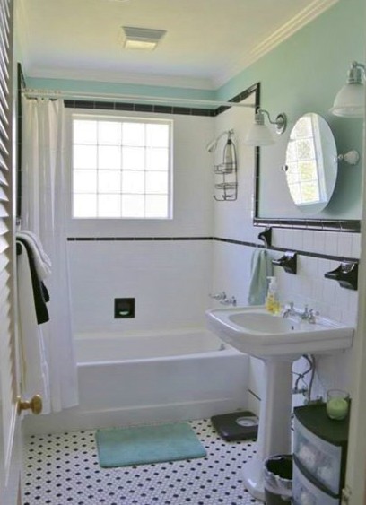 Design ideas for a small midcentury 3/4 bathroom in New Orleans with a pedestal sink, beaded inset cabinets, white cabinets, an alcove tub, a shower/bathtub combo, a two-piece toilet, black and white tile, ceramic tile, blue walls and ceramic floors.