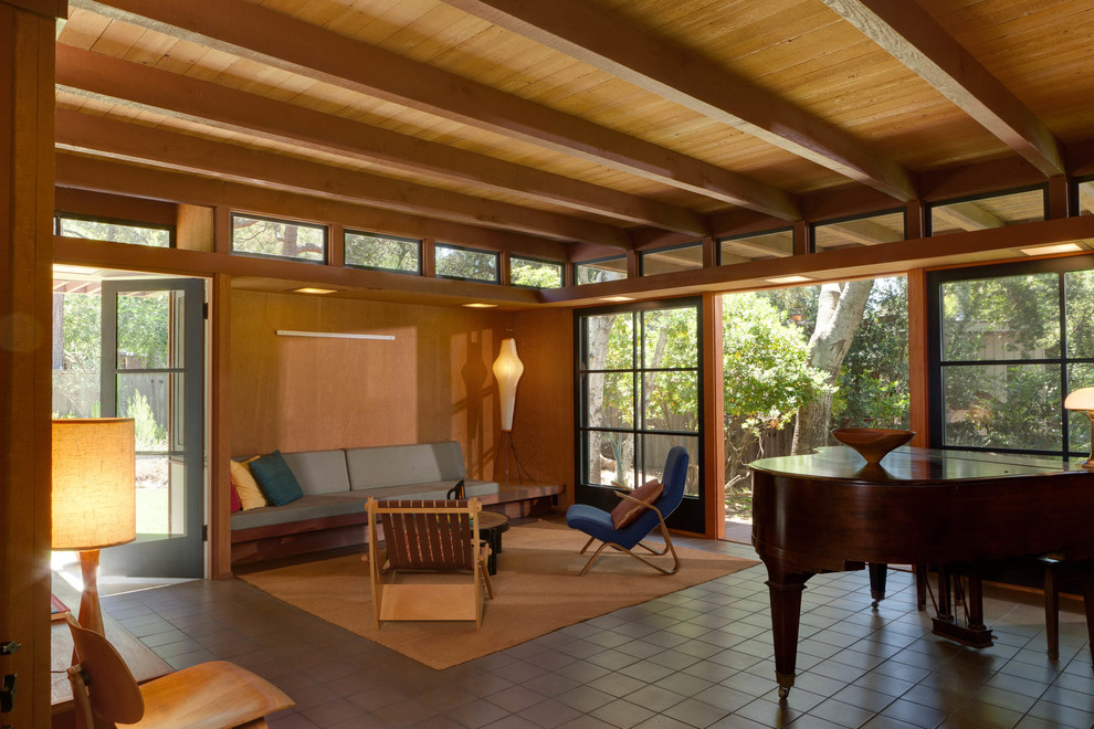 Inspiration for a mid-sized midcentury open concept living room in Los Angeles with a music area, ceramic floors, no fireplace and no tv.