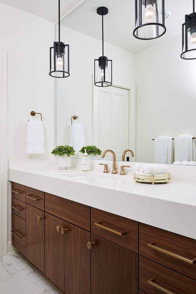 Design ideas for a large transitional 3/4 bathroom in Minneapolis with flat-panel cabinets, medium wood cabinets, an alcove shower, white tile, porcelain tile, white walls, porcelain floors, an undermount sink, engineered quartz benchtops, white floor and white benchtops.