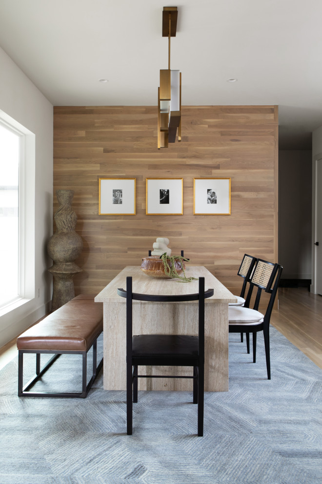 Dining room - contemporary light wood floor dining room idea in Dallas