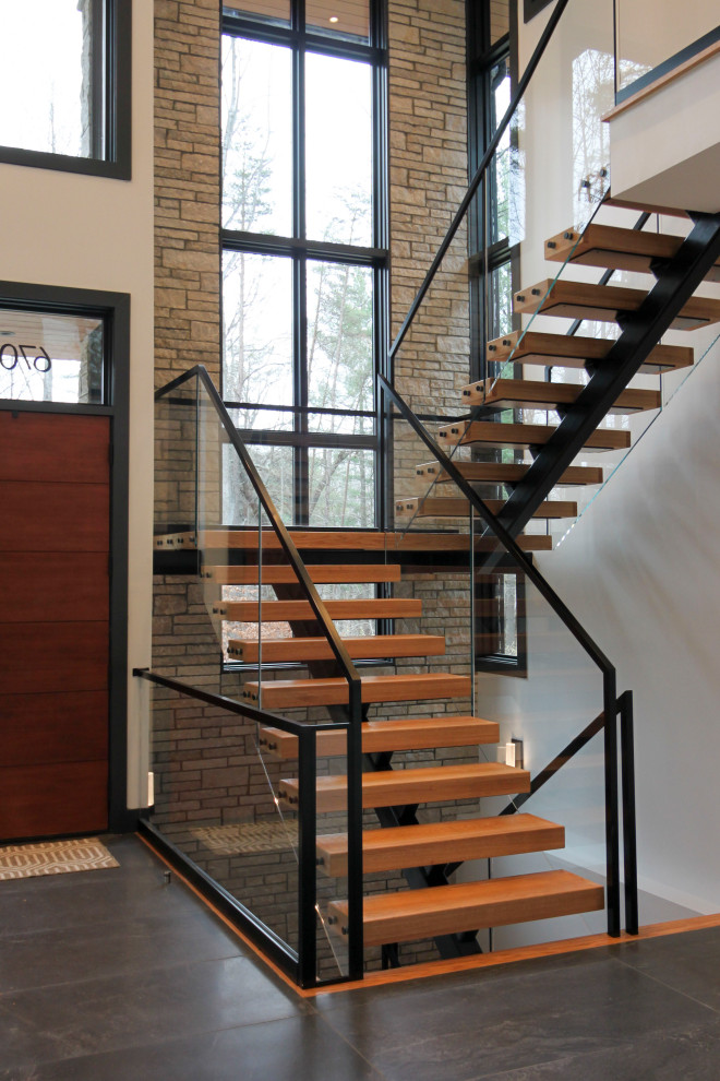 Inspiration for a large modern wood floating staircase in DC Metro.