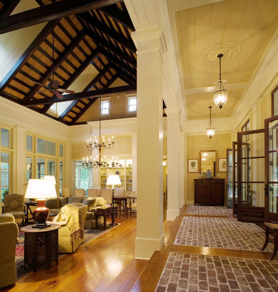 Design ideas for a traditional living room in Atlanta with brick floors.