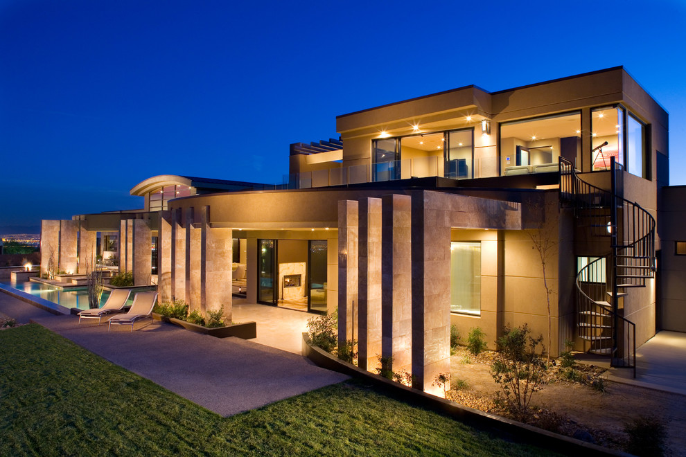 Design ideas for a contemporary two-storey beige exterior in Las Vegas.
