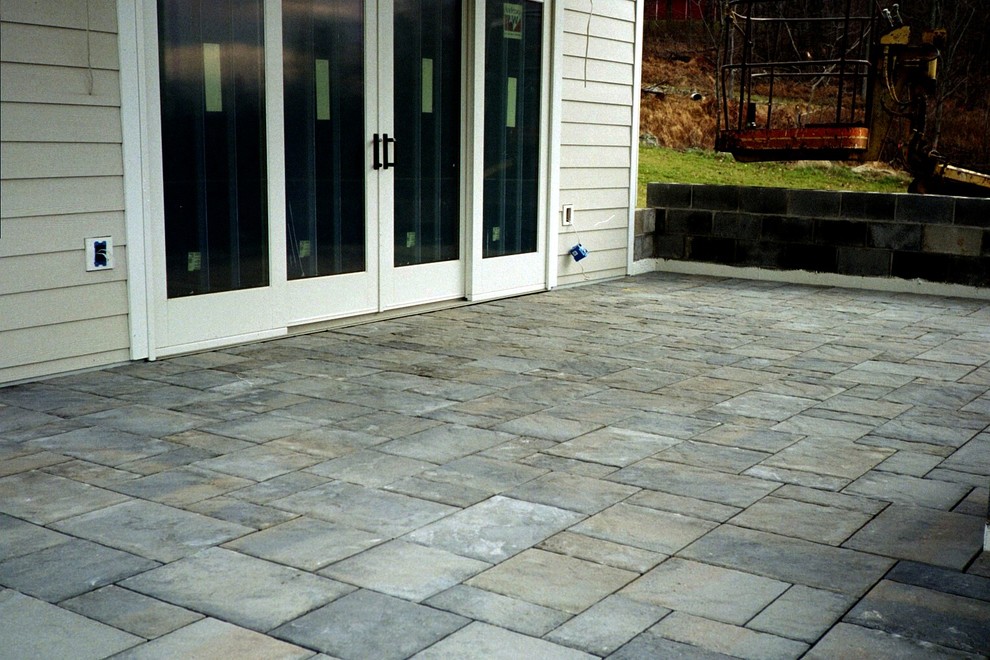 Inspiration for a large modern backyard concrete paver patio remodel in Baltimore