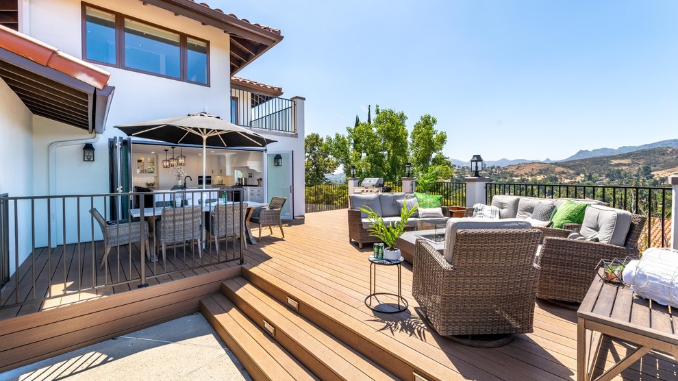 Deck - large transitional backyard deck idea with a fire pit and no cover