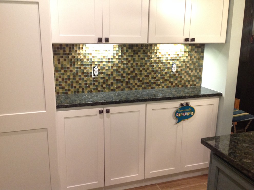 Example of a transitional home design design in Raleigh