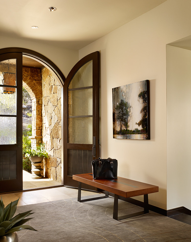 Contemporary foyer in Austin with beige walls, a double front door and a glass front door.