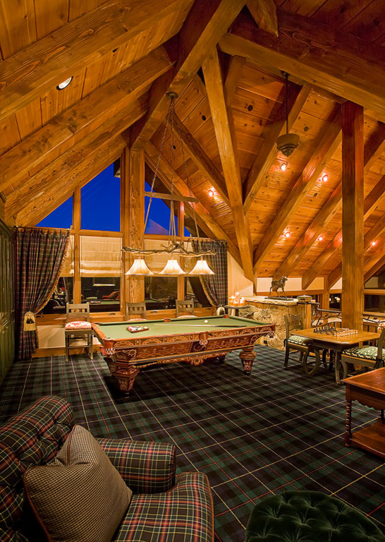 Photo of a mid-sized country loft-style family room in Albuquerque with carpet.