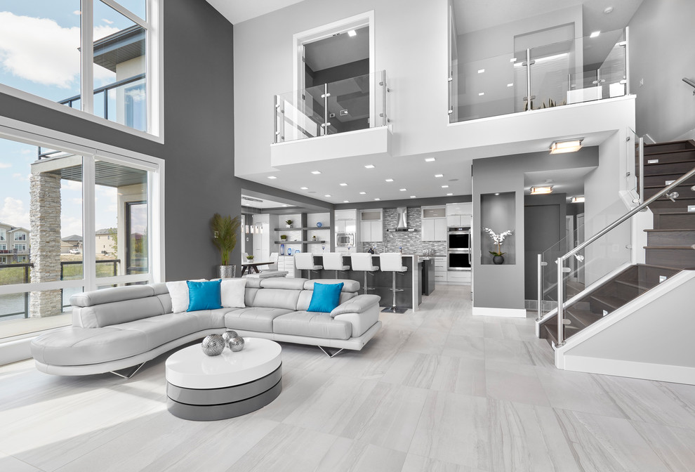 Inspiration for a large contemporary open concept living room in Edmonton with grey walls, porcelain floors, a ribbon fireplace, a tile fireplace surround, a built-in media wall and grey floor.