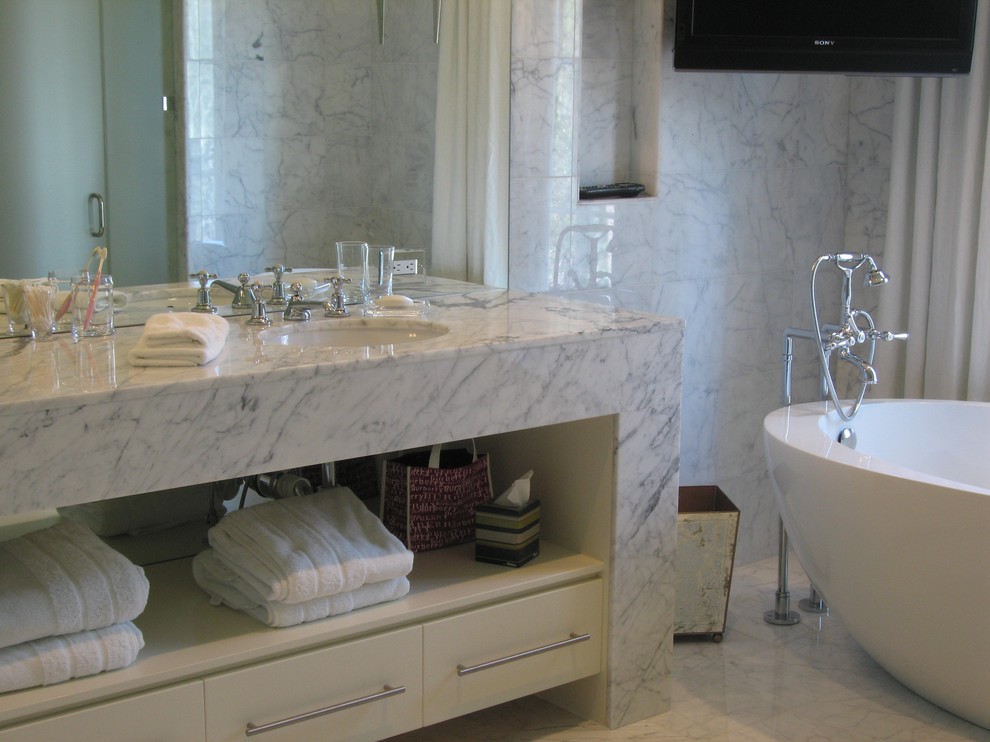 Design ideas for a contemporary bathroom in Atlanta with marble benchtops.