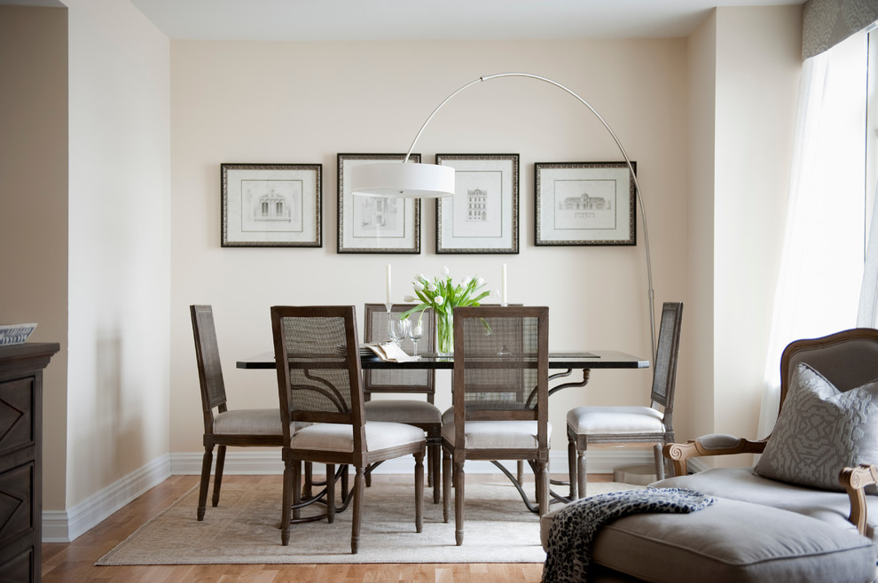 Inspiration for a mid-sized contemporary open plan dining in New York with beige walls, light hardwood floors and no fireplace.