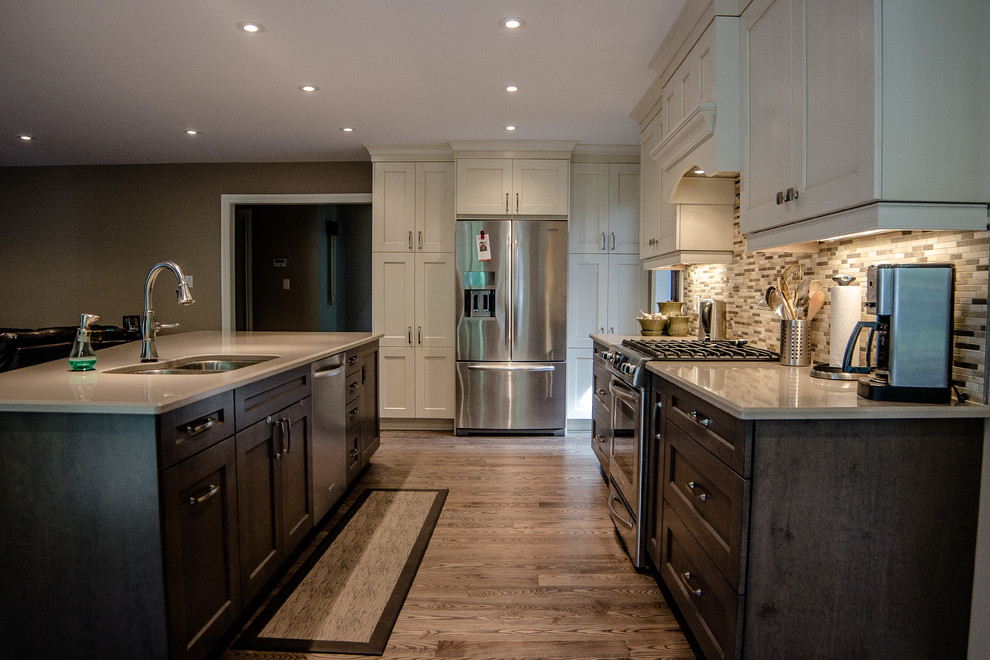 Example of a transitional kitchen design in Toronto