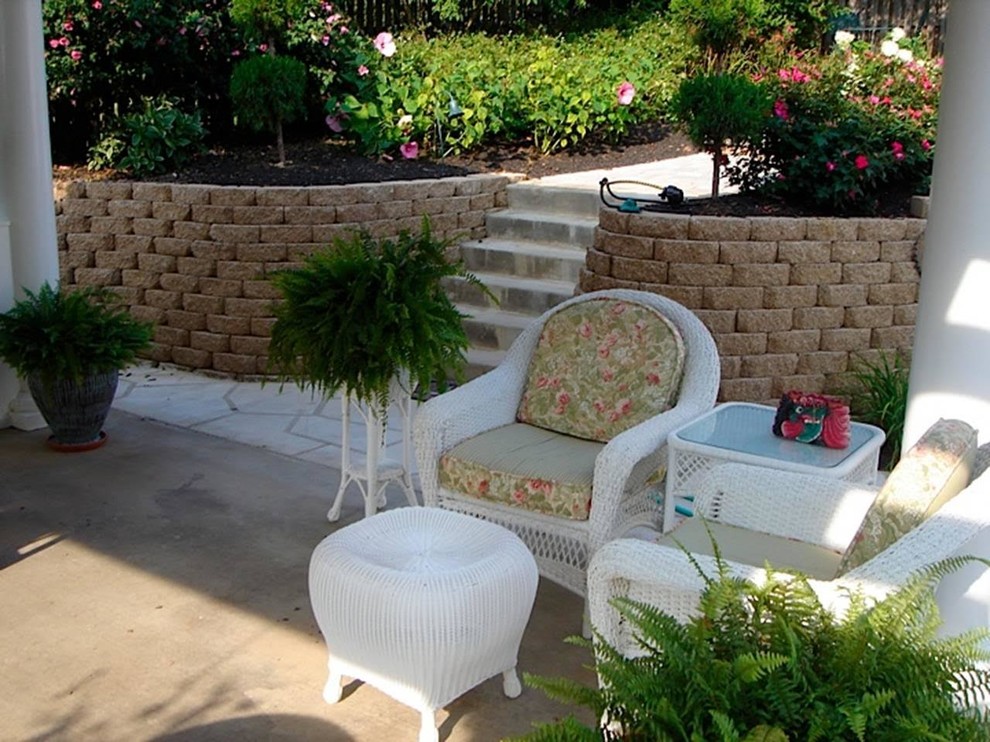 Inspiration for a large transitional backyard patio remodel in DC Metro with a roof extension