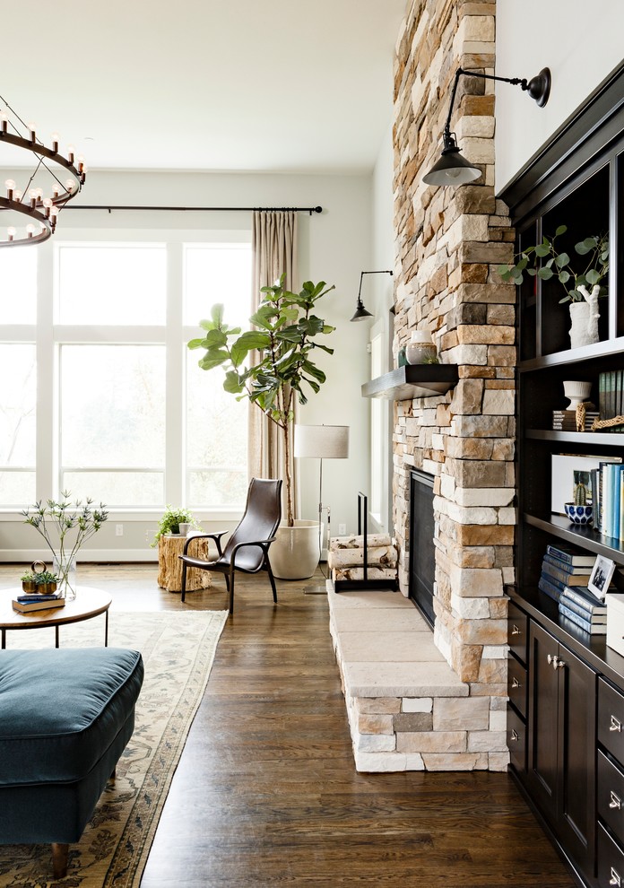 Inspiration for a mid-sized transitional formal open concept living room in Portland with white walls, dark hardwood floors, a standard fireplace and a stone fireplace surround.