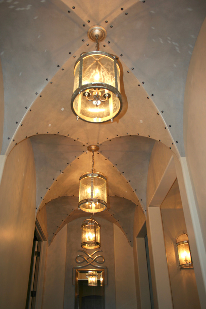 Inspiration for a mid-sized transitional hallway remodel in Columbus with beige walls
