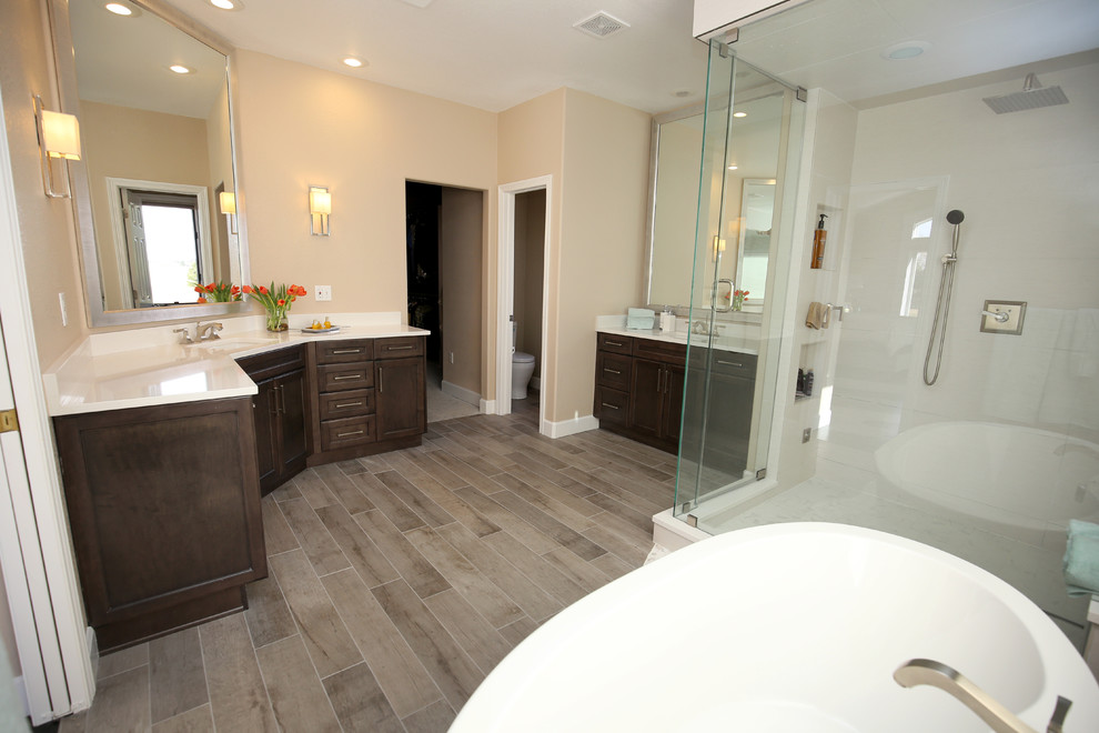 Example of a transitional bathroom design in Denver