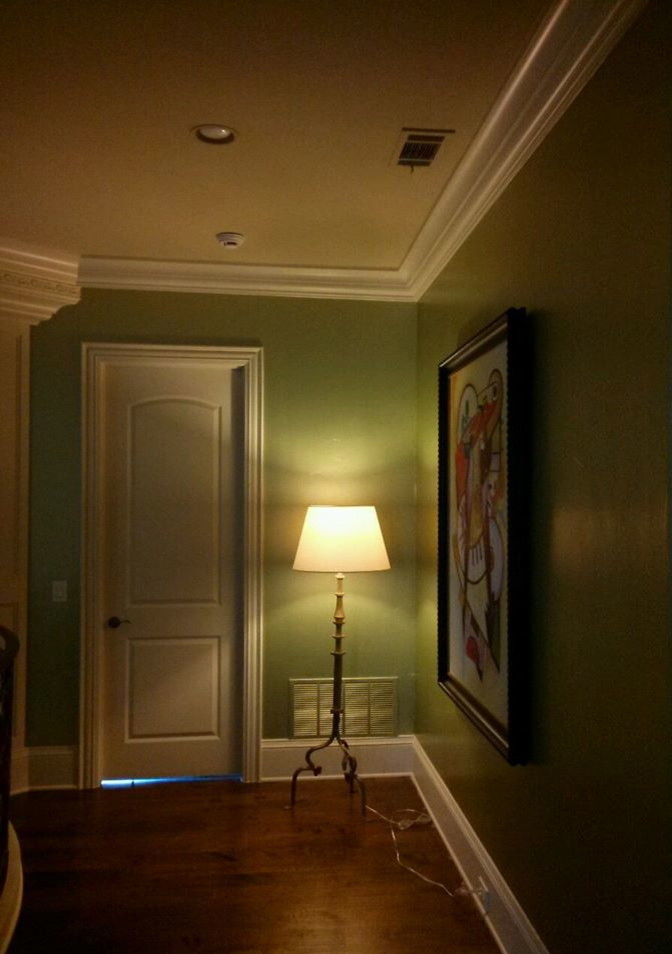 Minimalist hallway photo in Dallas with green walls
